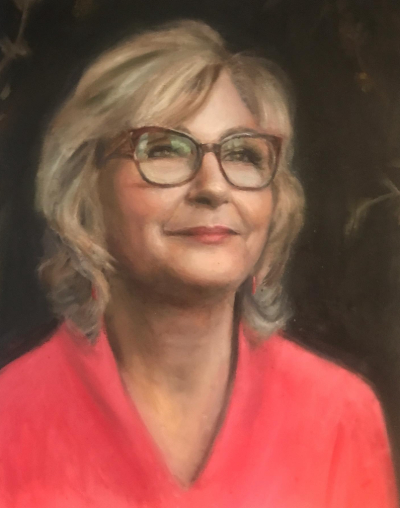 Oil portrait of a  woman with glasses wearing a red top, painted by Irish artist Deirdre Hayes
